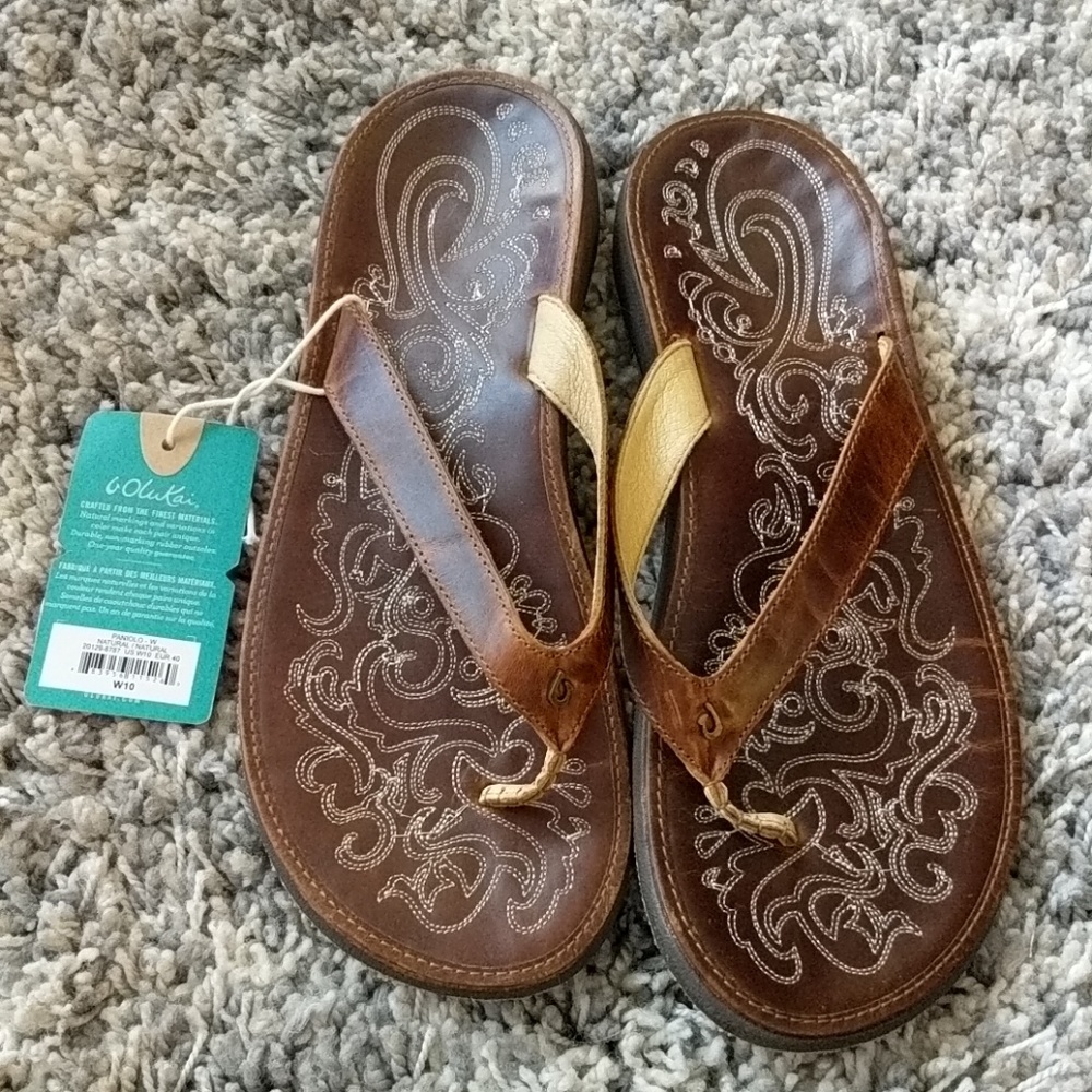 Faux leather OluKai flip flops.
